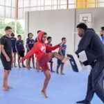 5554e380-campeao-mundial-de-taekwondo-henrique-marques-visita-alunos-de-escola-municipal-em-itaborai-3